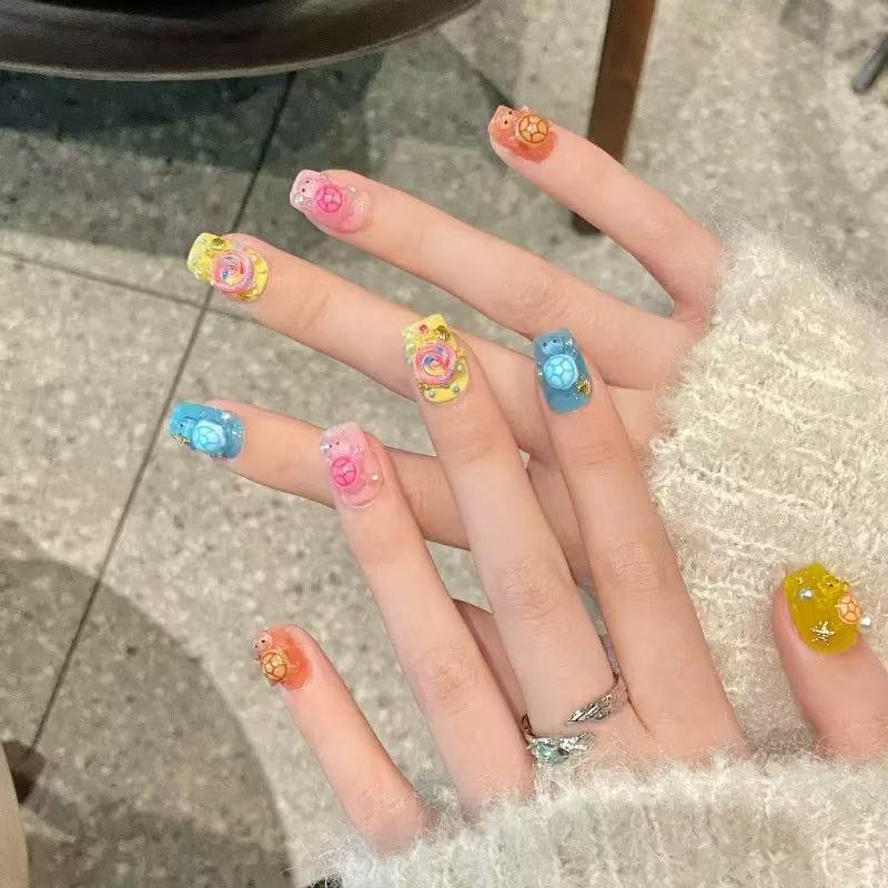 100 قطعة من الزخارف الراتنجية  - مراجعة Nail Art وسعره